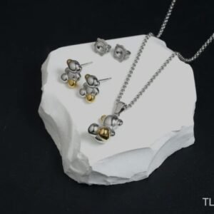 Set de Collar y Aretes Bicolor con Dijes de Osito en Plata y Dorado