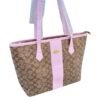 Cartera COACH tote beige , elegante y moderna.