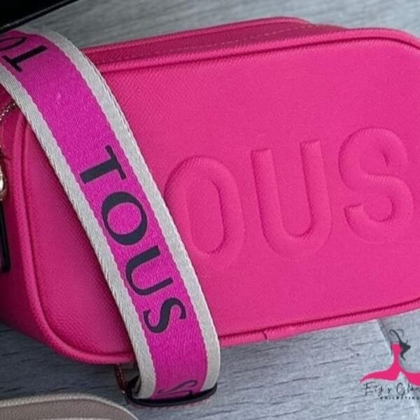 Cartera TOUS  viajera con diseño moderno