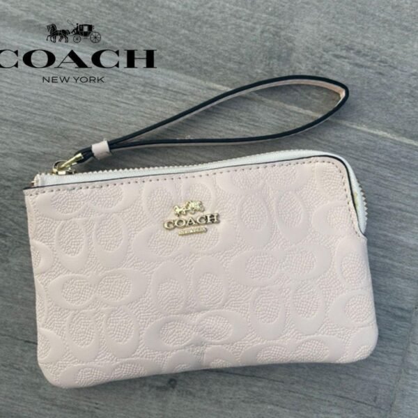 Cartera de mano COACH en cuero