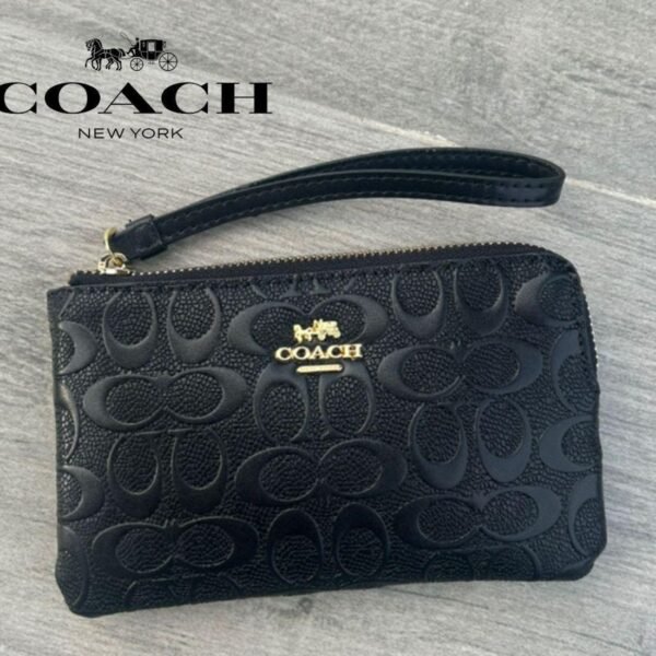 Cartera de mano COACH en cuero